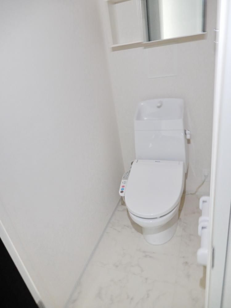 �y�Z�L�����e�B�z�@